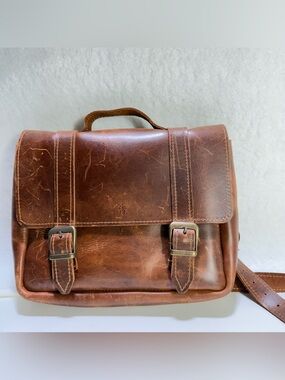 leather satchel crossbody bag with a structured flap front double buckles